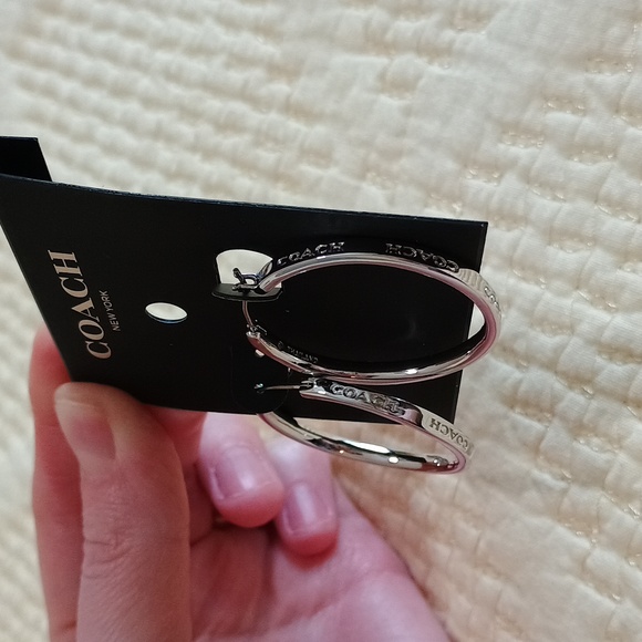 Coach Silver Tone Hoop Earrings - Picture 2 of 8